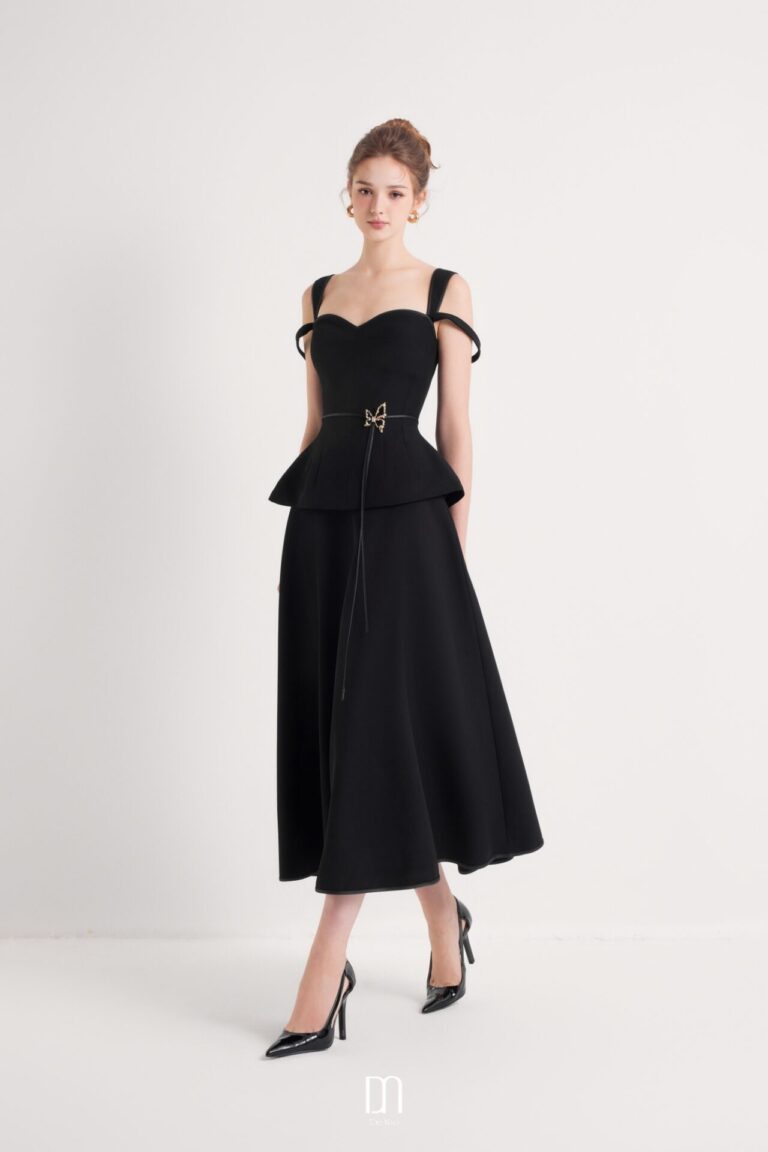 Aine Stylized Peplum Top Mixing Hem