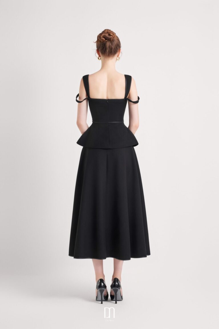 Aine Stylized Peplum Top Mixing Hem